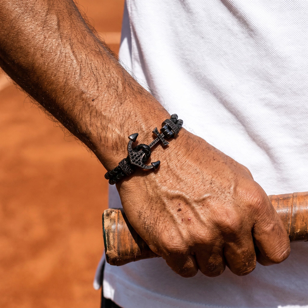 Black Anchor Bracelet – holding a tennis racket | Brother & Sisters | SKU: 3621358-gun-black-XS-14-15, 3621358-gun-black-S-16-17, 3621358-gun-black-M-18-19, 3621358-gun-black-L-20-21, 3621358-gun-black-XL-22-23