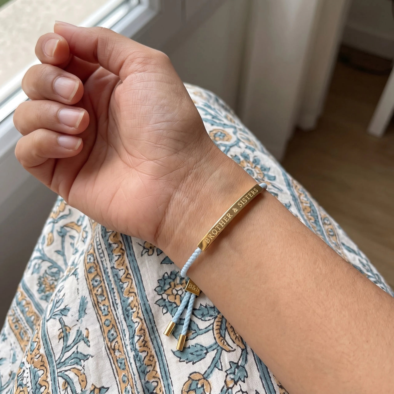 Cord bracelet — worn, real size, gold | SKU: leciel-g