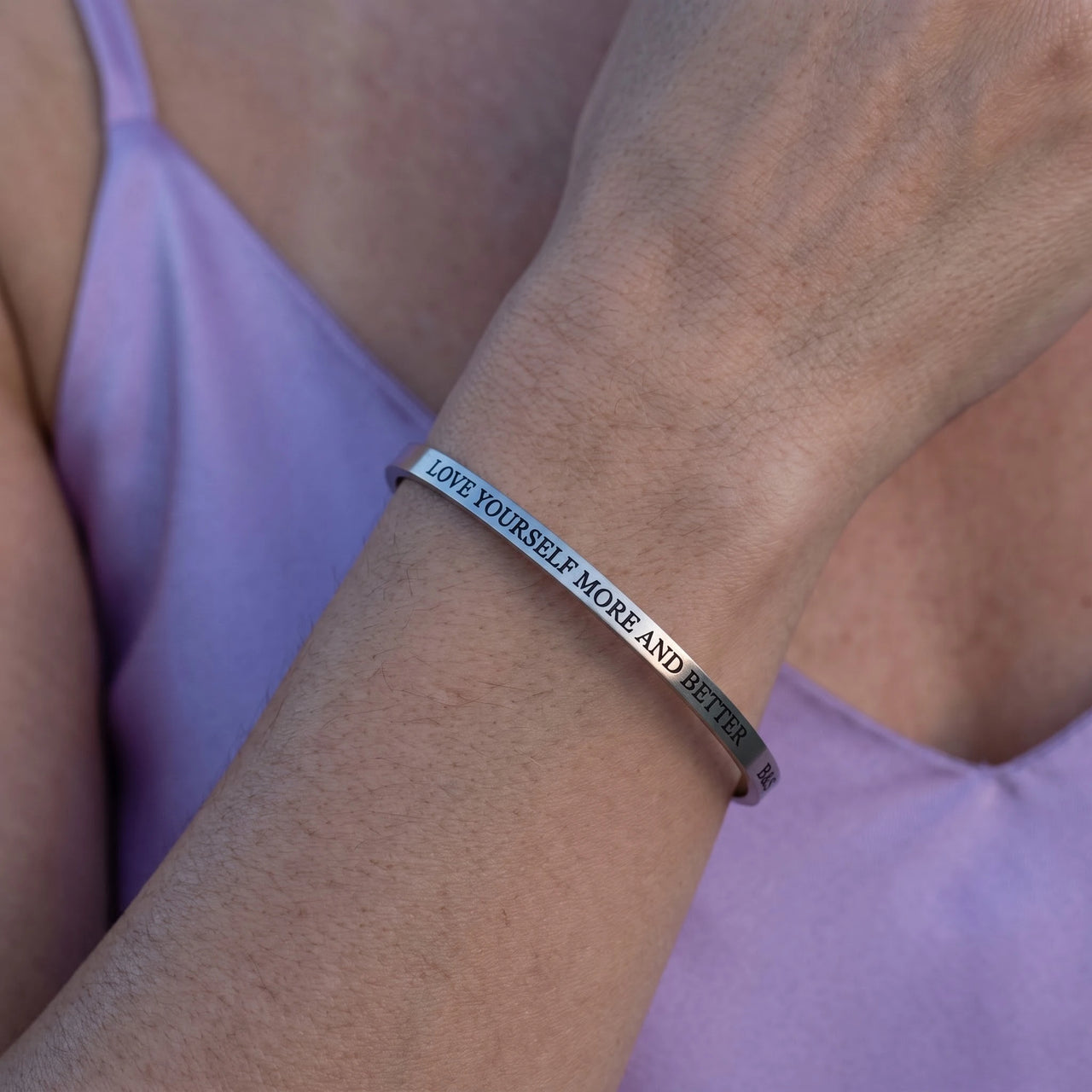 Close-up of the Love Yourself More And Better bracelet in silver worn | SKU: lymab-wg