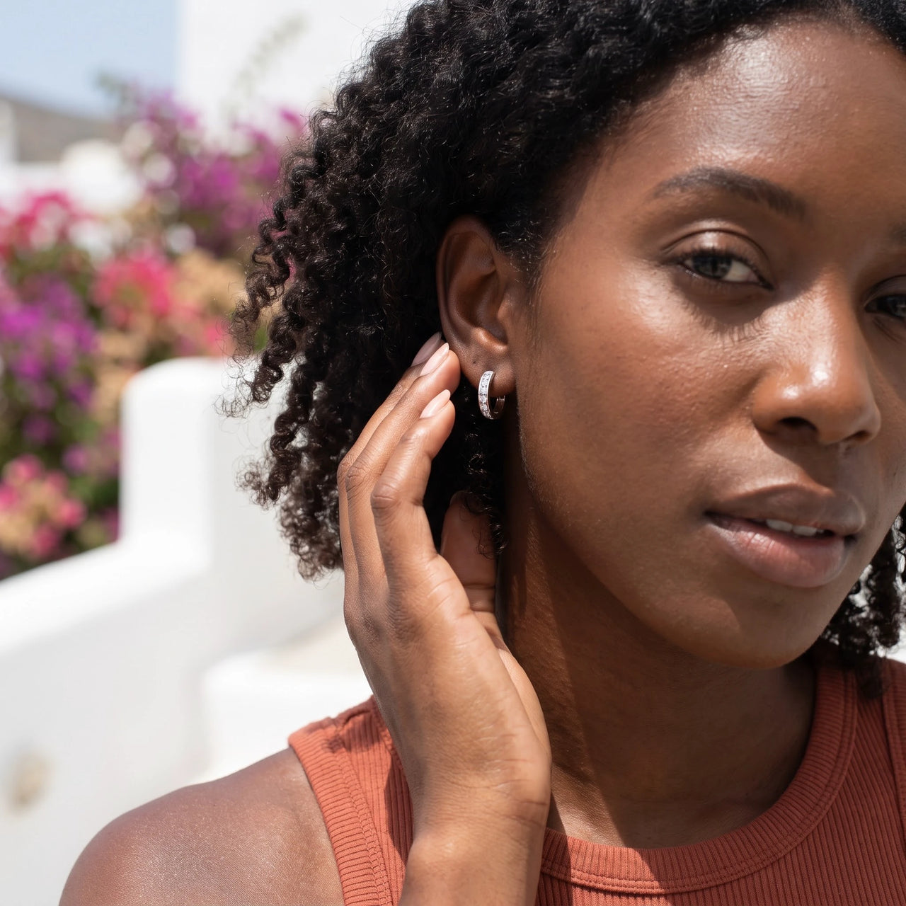 Crystal hoop earrings — worn, everyday gesture, silver | SKU: 22023999-rhodium