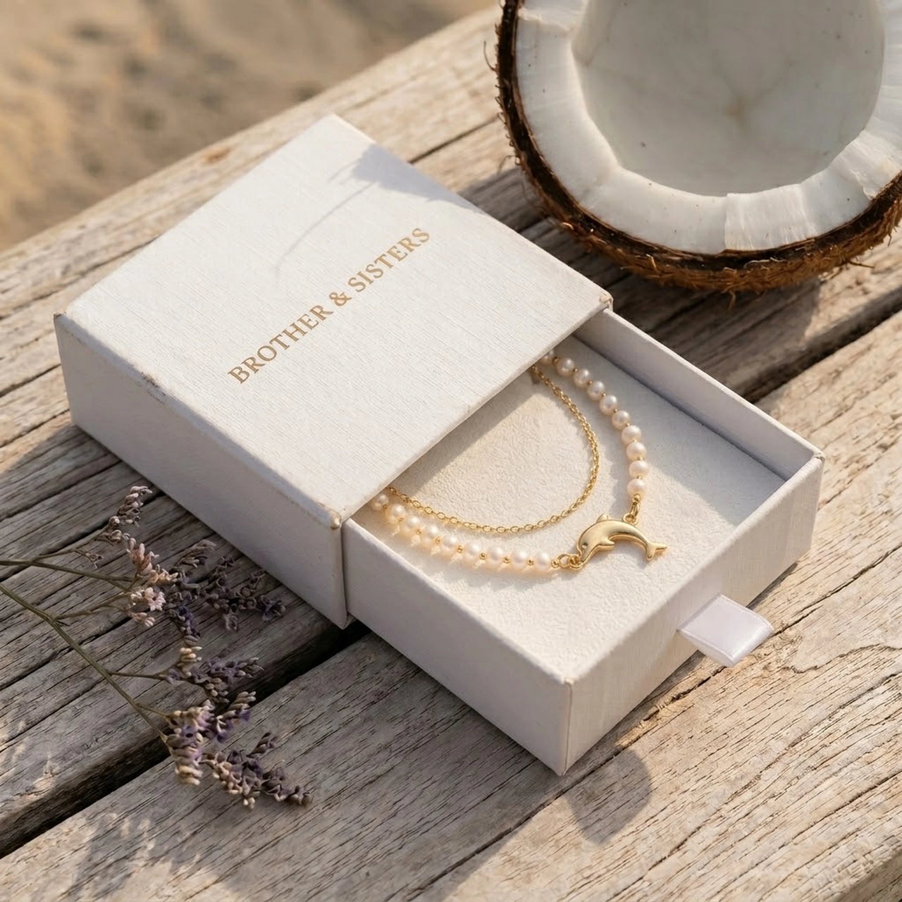 Pearl Dolphin Anklet Set presented in the white Brother & Sisters gift box, gold dolphin charm and freshwater pearls.