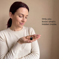 Thumbnail for Woman holding the gold cushion-cut bracelet in her palm, its plaque plain black: only you know what's hidden inside | SKU: TPH-CUSB-GOLD