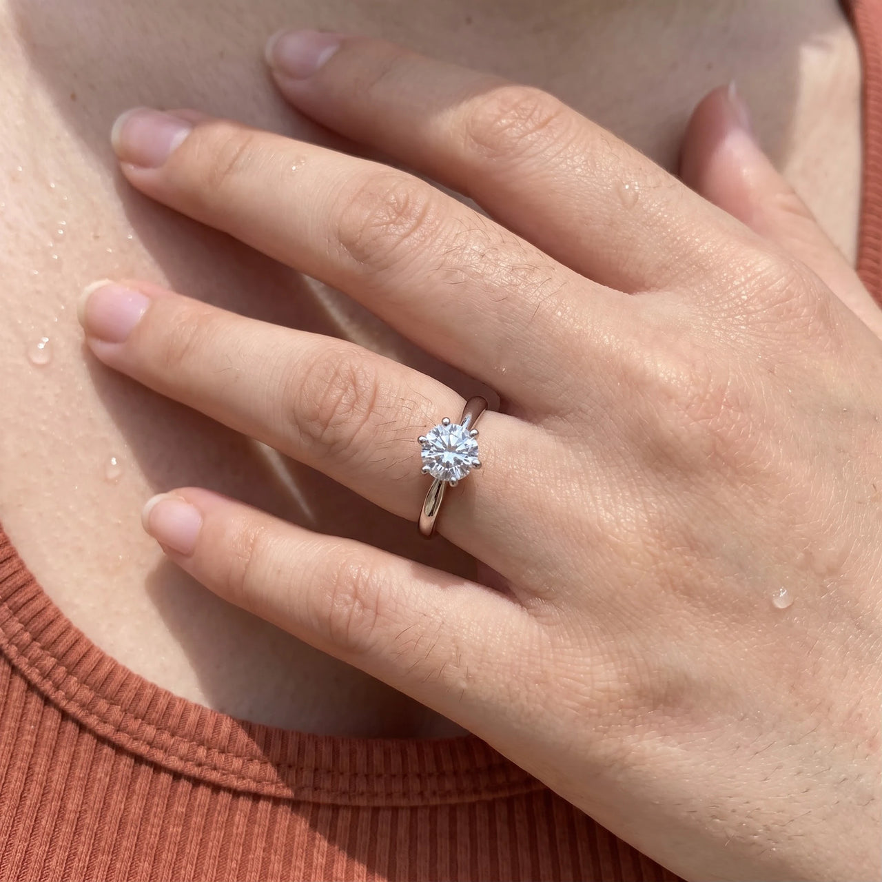 Close-up of the silver ring worn on the skin | SKU: 33759698-4.5-silver